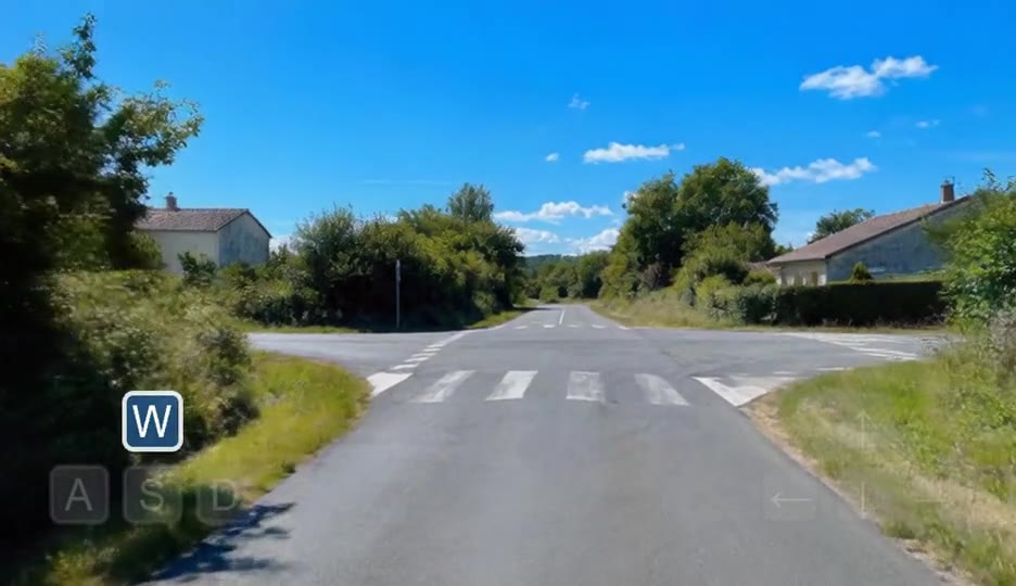 A frame from Astra's action-conditioned driving video demo at an intersection.